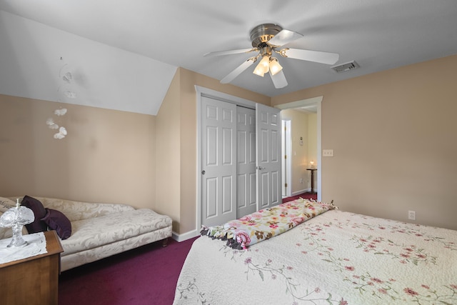 bedroom with a closet, visible vents, baseboards, ceiling fan, and dark colored carpet