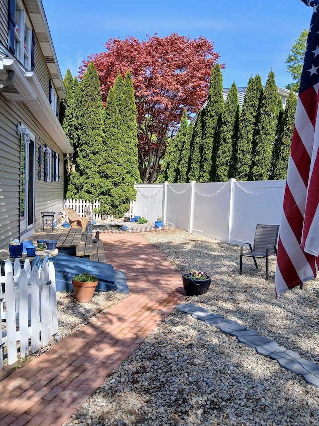 exterior space featuring a fenced backyard