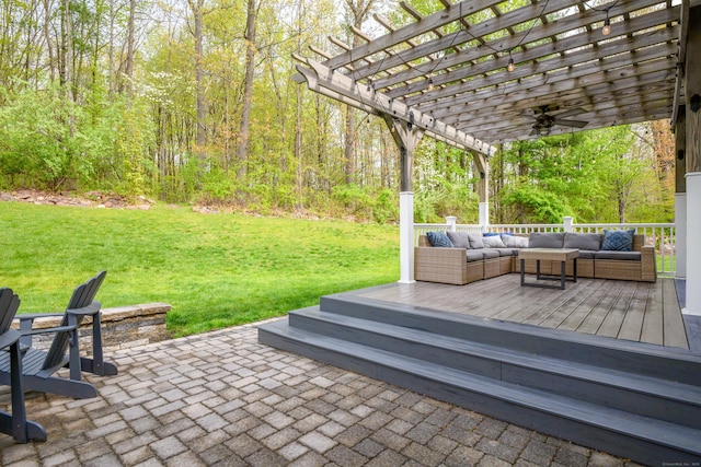 view of patio / terrace featuring a ceiling fan, a wooden deck, a pergola, and outdoor lounge area