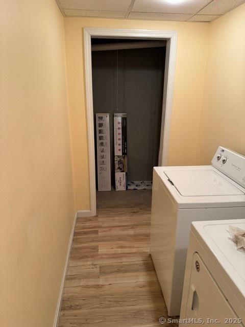 36 Meadowrue Dr Unit 36, Glastonbury, CT 06033 - laundry area featuring washer and dryer, laundry area, light wood-style flooring, and baseboards