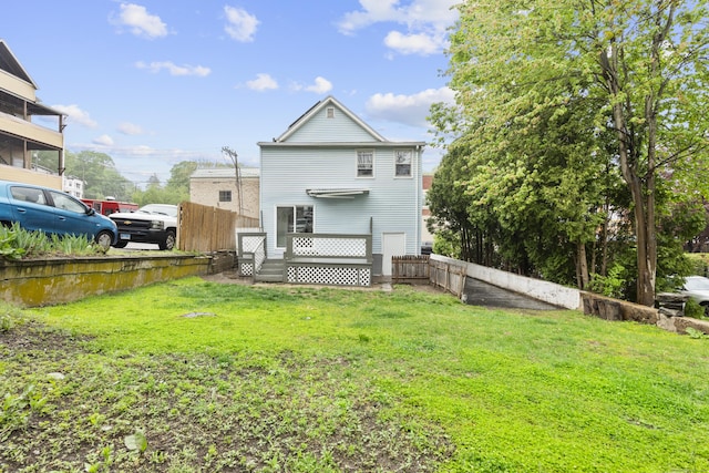 18 Brook St, Shelton, CT 06484 - rear view of property featuring fence and a lawn