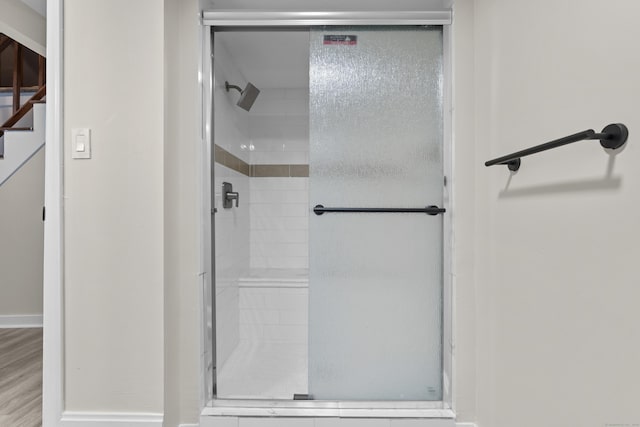 18 Brook St, Shelton, CT 06484 - bathroom with a stall shower and wood finished floors