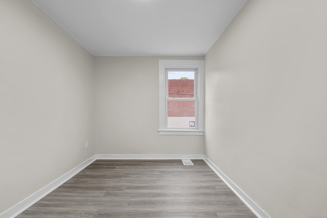 18 Brook St, Shelton, CT 06484 - empty room with baseboards and wood finished floors