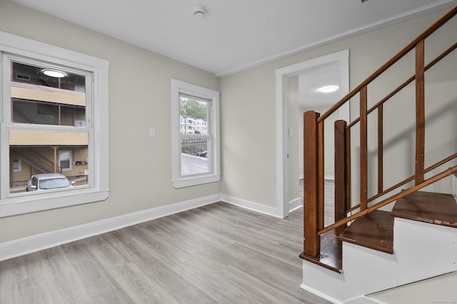 18 Brook St, Shelton, CT 06484 - entrance foyer with baseboards, stairs, and wood finished floors