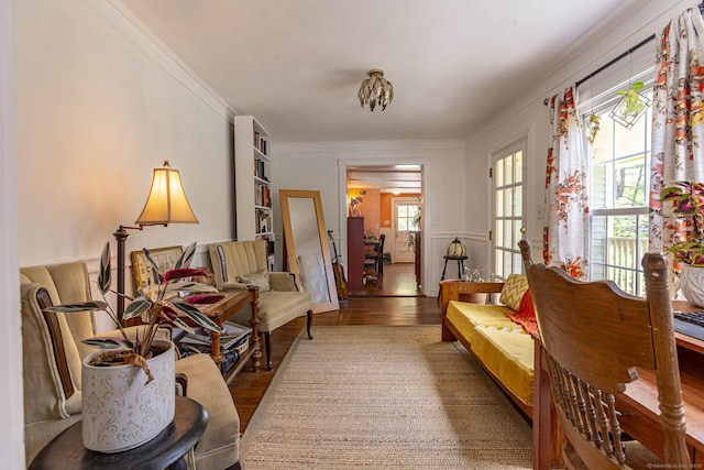 interior space featuring ornamental molding and wood finished floors