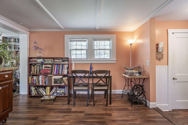 dining room featuring ornamental molding and wood finished floors