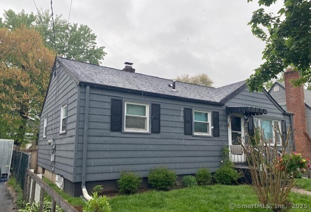142 Yale St, Hartford, CT 06106 - view of front of house featuring a chimney