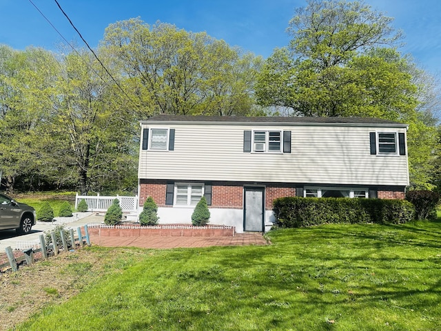 5 N Ridgeland Rd, Wallingford, CT 06492 - view of front facade with a front yard and brick siding