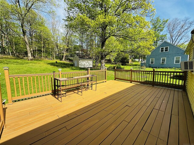 5 N Ridgeland Rd, Wallingford, CT 06492 - wooden terrace with a storage shed, a yard, an outbuilding, and central AC unit