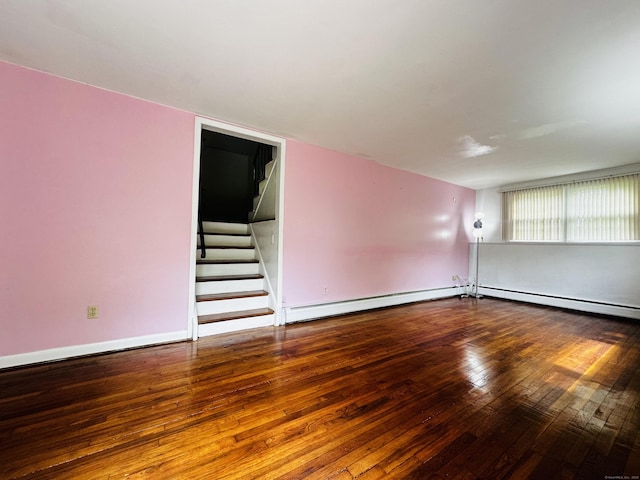 5 N Ridgeland Rd, Wallingford, CT 06492 - empty room with hardwood / wood-style floors, stairs, baseboard heating, a baseboard heating unit, and baseboards