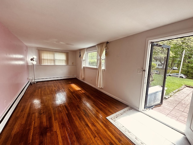 5 N Ridgeland Rd, Wallingford, CT 06492 - spare room with a baseboard heating unit, hardwood / wood-style floors, and baseboards