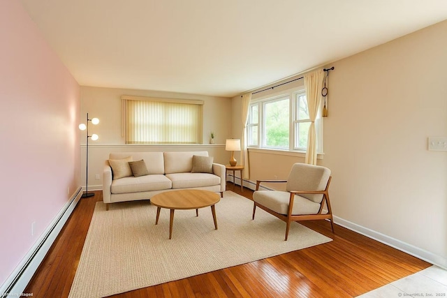 5 N Ridgeland Rd, Wallingford, CT 06492 - living room with baseboard heating, hardwood / wood-style floors, and baseboards