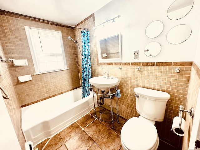 5 N Ridgeland Rd, Wallingford, CT 06492 - bathroom with tile walls, tile patterned flooring, toilet, shower / tub combo with curtain, and wainscoting