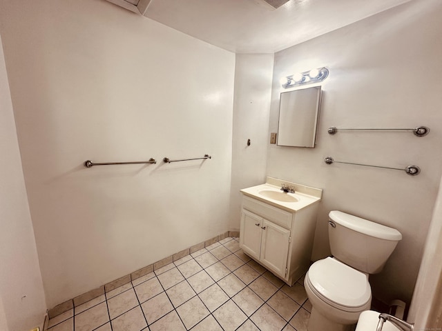 5 N Ridgeland Rd, Wallingford, CT 06492 - bathroom with toilet, tile patterned flooring, vanity, and baseboards