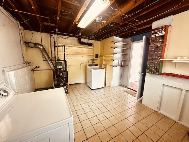 5 N Ridgeland Rd, Wallingford, CT 06492 - clothes washing area with washing machine and clothes dryer and light tile patterned floors