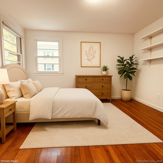 5 N Ridgeland Rd, Wallingford, CT 06492 - bedroom with wood finished floors and baseboards
