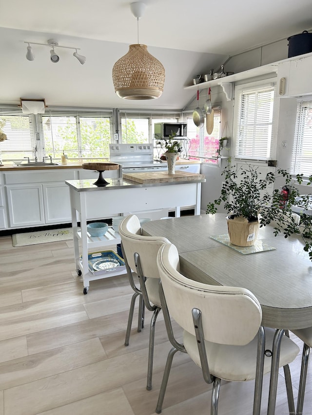 1 4th St, Madison, CT 06443 - dining space featuring light wood-style floors