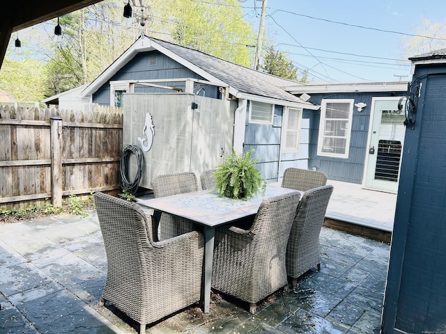1 4th St, Madison, CT 06443 - view of patio / terrace featuring outdoor dining area and an outdoor structure