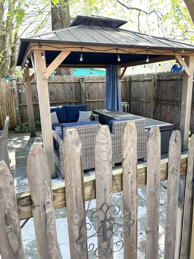 1 4th St, Madison, CT 06443 - fenced backyard featuring a gazebo and a patio area