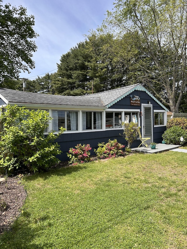 1 4th St, Madison, CT 06443 - ranch-style house with a front lawn and roof with shingles