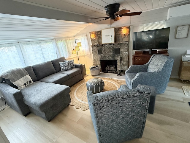 1 4th St, Madison, CT 06443 - living area with ceiling fan, wooden ceiling, wood finished floors, and a stone fireplace