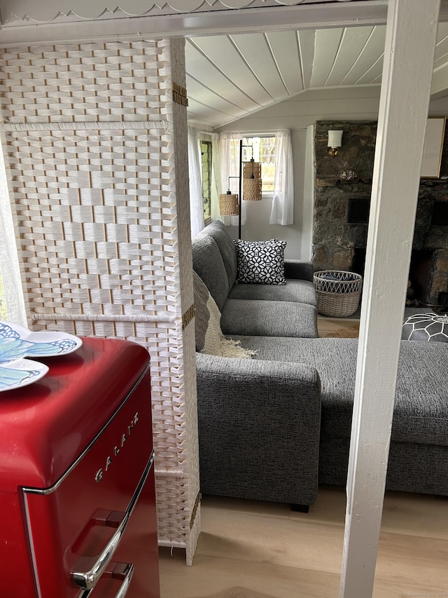 1 4th St, Madison, CT 06443 - living area featuring vaulted ceiling and wood finished floors