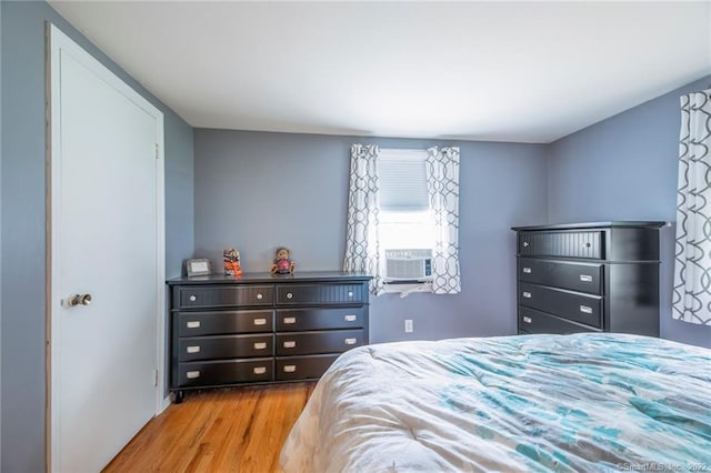 76 Chidsey Dr, North Branford, CT 06471 - bedroom featuring cooling unit and wood finished floors