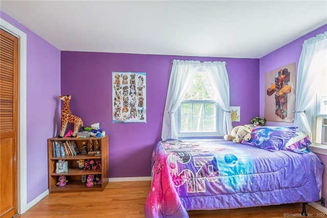 76 Chidsey Dr, North Branford, CT 06471 - bedroom with baseboards and wood finished floors