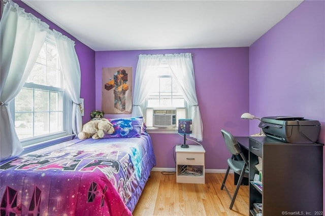 76 Chidsey Dr, North Branford, CT 06471 - bedroom featuring baseboards, cooling unit, and wood finished floors