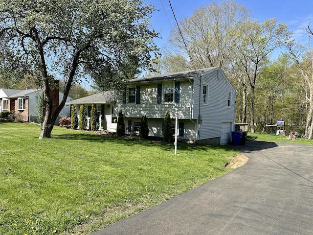 76 Chidsey Dr, North Branford, CT 06471 - split level home featuring a front lawn and driveway