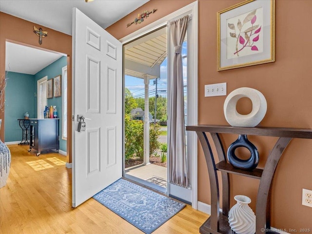 149 Tromley Rd, East Windsor, CT 06088 - entrance foyer featuring wood finished floors and baseboards