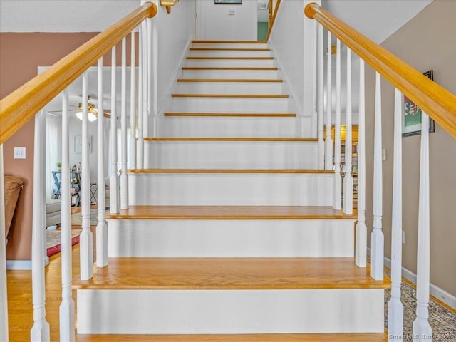 149 Tromley Rd, East Windsor, CT 06088 - stairway with a ceiling fan and baseboards