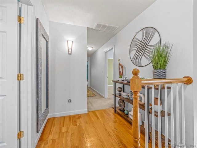 149 Tromley Rd, East Windsor, CT 06088 - hallway with light wood-style flooring and baseboards