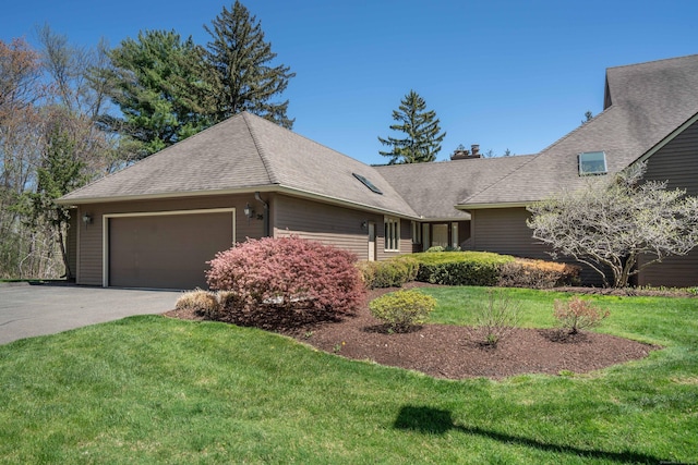 26 Alice Dr Unit 26, Bloomfield, CT 06002 - single story home with a chimney, a garage, a shingled roof, a front yard, and aphalt driveway