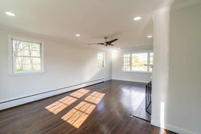 empty room with a baseboard heating unit, ornamental molding, recessed lighting, and baseboards