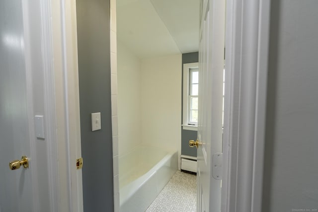 bathroom featuring a bathtub, tile patterned flooring, a baseboard radiator, and a shower