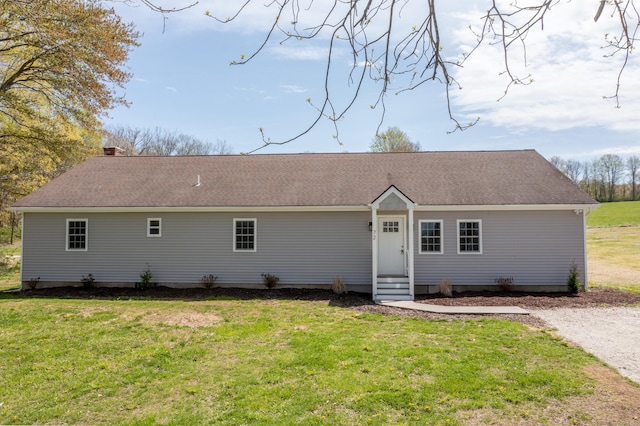 72 Old Canterbury Rd, Hampton, CT 06247 - rear view of property featuring a lawn, a chimney, and a shingled roof