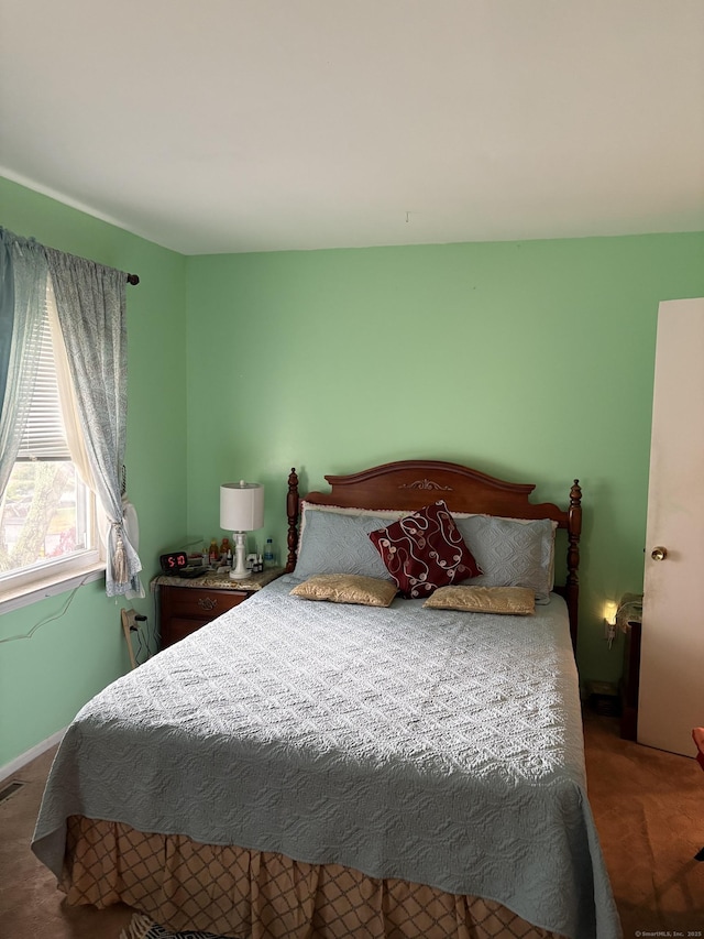 bedroom featuring visible vents