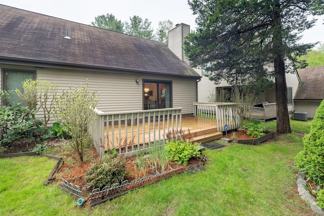 7 Copper Hill Dr Unit 7, Guilford, CT 06437 - rear view of property featuring a yard, a chimney, a wooden deck, and central AC