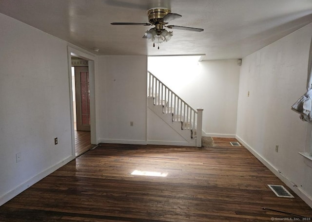 1067 Hartford Tpke, Waterford, CT 06385 - unfurnished living room with visible vents, a ceiling fan, wood finished floors, and stairway