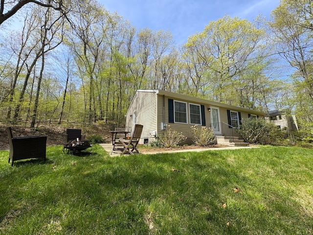 161 Old New London Rd, Salem, CT 06420 - view of front of home with a fire pit and a front lawn