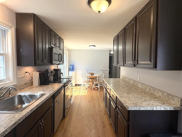 161 Old New London Rd, Salem, CT 06420 - kitchen featuring a sink, light countertops, stainless steel appliances, and light wood finished floors