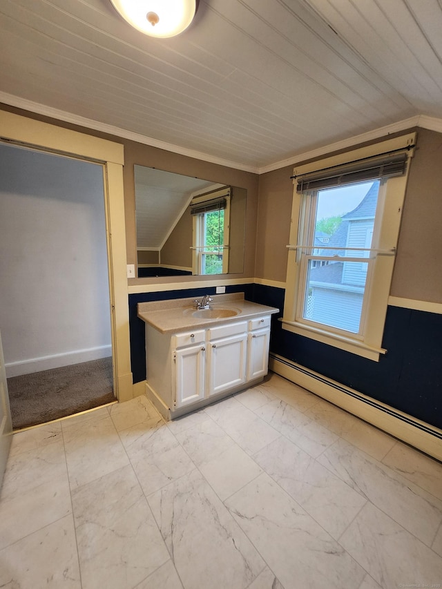 kitchen with a sink, vaulted ceiling, white cabinetry, light countertops, and baseboard heating