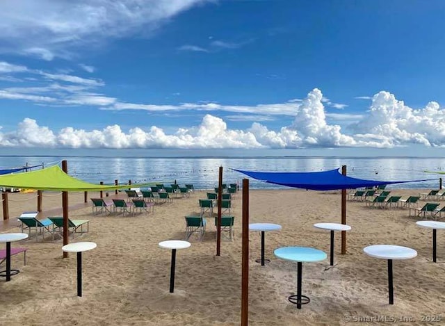 view of play area with a water view