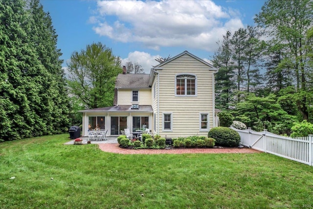 399 N Benson Rd, Fairfield, CT 06824 - rear view of property with a chimney, a patio, and a shingled roof
