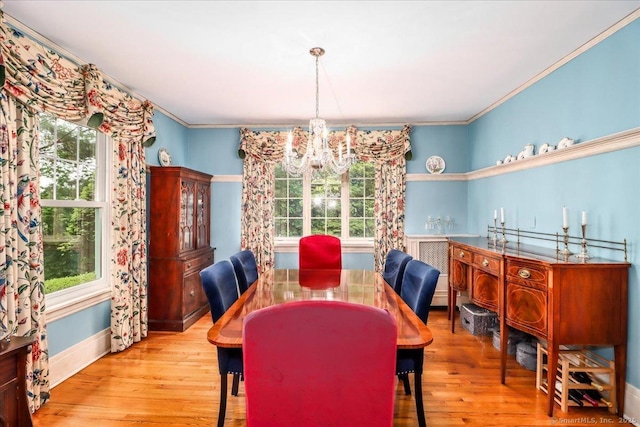 399 N Benson Rd, Fairfield, CT 06824 - dining area featuring a chandelier, healthy amount of natural light, hardwood / wood-style floors, and crown molding