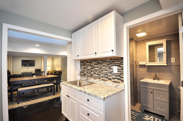 6 Brookside Dr Unit 6, Middlebury, CT 06762 - kitchen with white cabinets, a sink, and dark wood-type flooring
