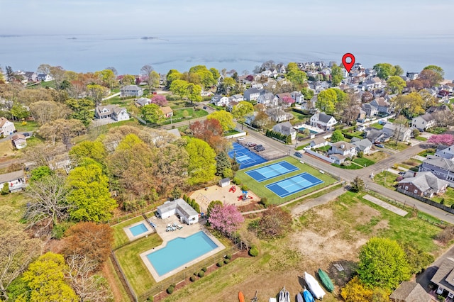 aerial view with a water view and a residential view