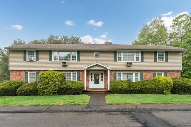 1789 Foxon Rd Apt 7B, North Branford, CT 06471 - colonial inspired home with brick siding and a front yard