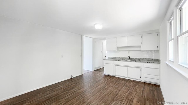 76 Midway Dr, Bethel, CT 06801 - kitchen featuring white cabinetry, backsplash, baseboards, and dark wood-type flooring